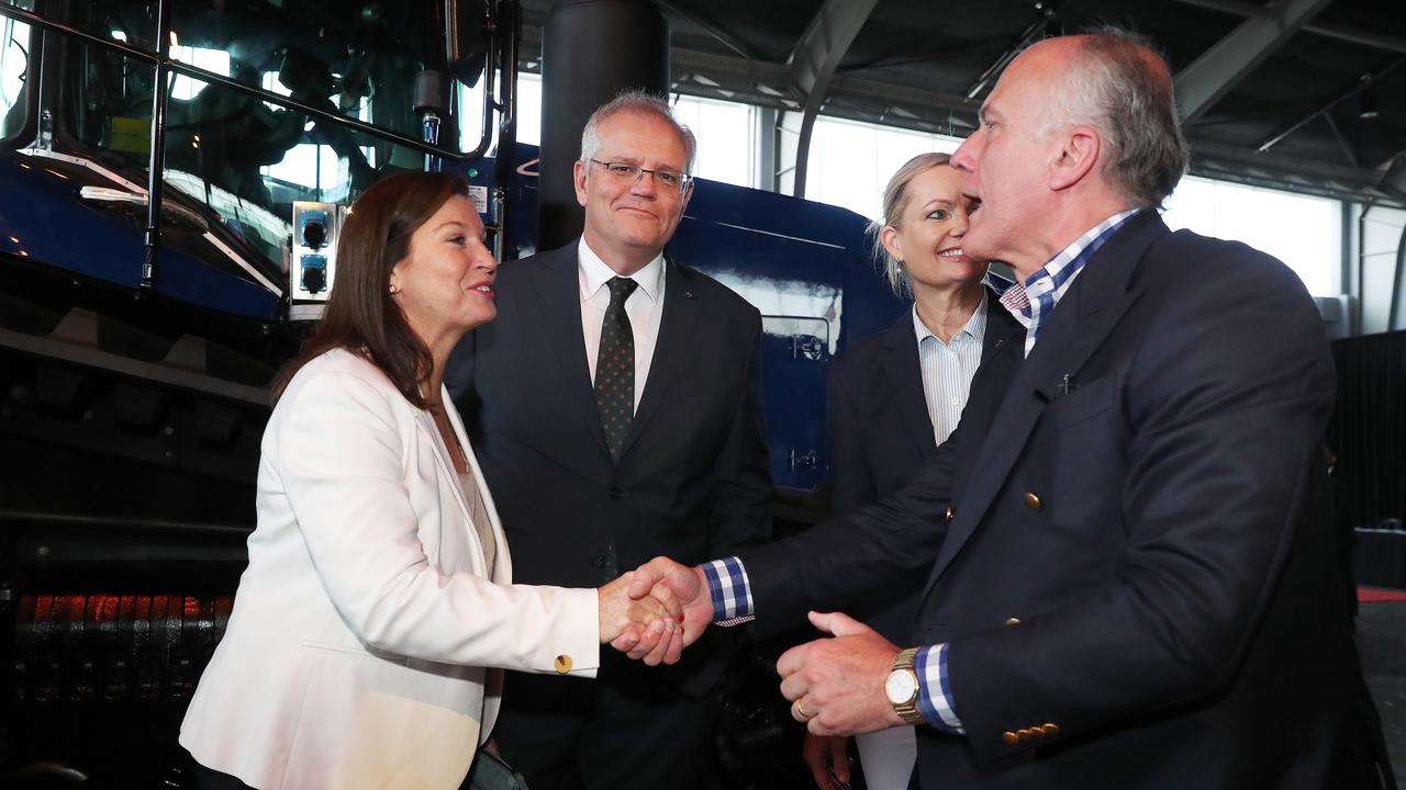 Prime Minister Scott Morrison with wife Jenny shaking Senator Eric Abetz’s hand. Picture: Nikki Davis-Jones