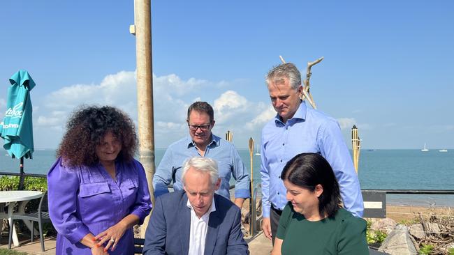 (L-R, back) Senator Malarndirri McCarthy, Solomon MP Luke Gosling, Jobs Minister Joel Bowden, (L-R, front) Federal Immigration Minister Andrew Giles, and Chief Minister Natasha Fyles signing an extension to the DAMA visa program bringing skilled migrant workers to the NT. Picture: Fia Walsh