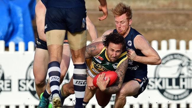 Panthers’ star Nick Liddle brings down Eagles' Scott Lewis. Picture: Tom Huntley