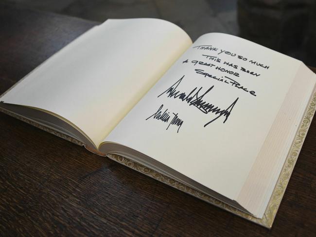 The Trumps signed the visitors book at Westminster Abbey. Picture: AP