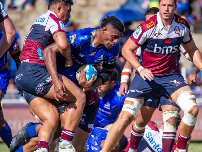 SUVA, FIJI - MAY 03: Mesake Vocevoce of Drua runs with the ball to score a try during the round 12 Super Rugby Pacific match between Fijian Drua and Queensland Reds at HFC Stadium, on May 03, 2025, in Suva, Fiji. (Photo by Pita Simpson/Getty Images)