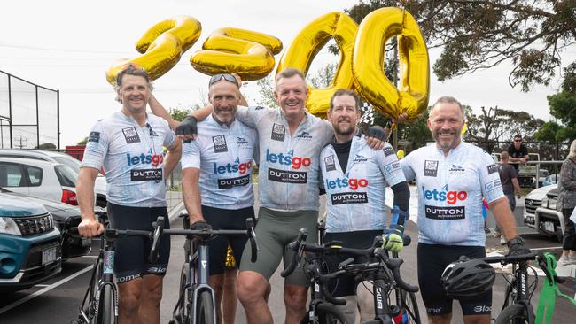 AFL legend Tony Lockett (second from left) arrives in Mornington after a fundraising ride from Perth with footy mates (from left to right) Guy Stringer, Tim Allen, Brent Loughrey and Ben Adam. Picture: Tony Gough