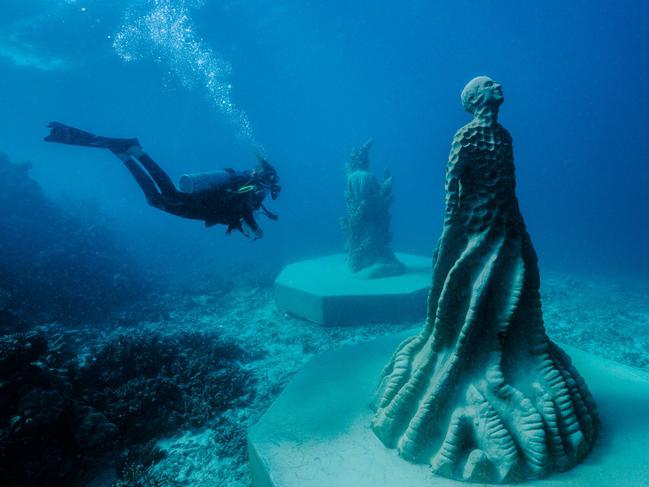 Two of the new sentinels at the Museum of Underwater Art, off Townsville. Picture: Townsville Enterprise