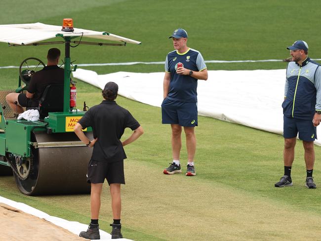 PERTH, AUSTRALIA - NOVEMBER 19: Andrew McDonald and Daniel Vettori inspect the pitch before an Australia Test Squad training session at Optus Stadium on November 19, 2024 in Perth, Australia. (Photo by Paul Kane/Getty Images)