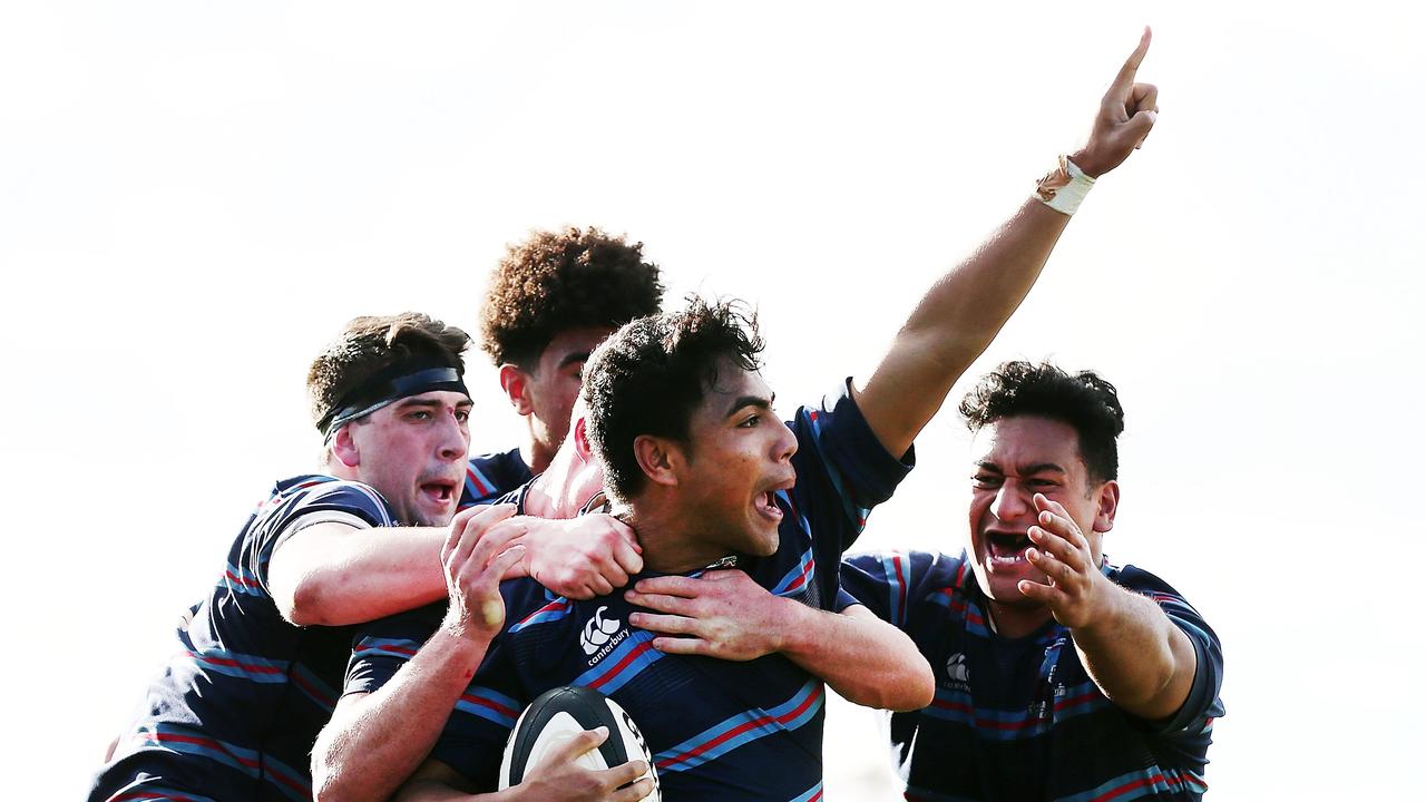 Lemeki Namoa of Sacred Heart celebrates after scoring a try during the schools rugby match between St Kent's and Sacred Heart on August 13, 2016. Picture: Anthony Au-Yeung/Getty Images