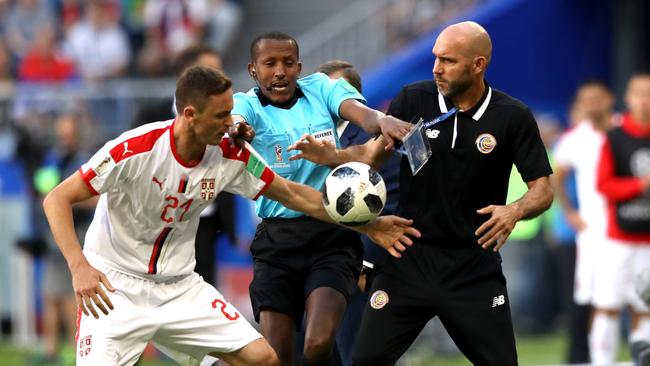 Nemanja Matic clashes with Costa Rica coach Luis Marin.