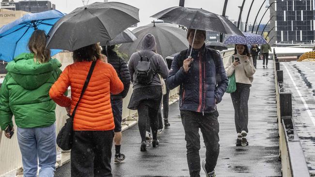 Umbrellas are also in high demand as rain continues to fall across parts of Queensland. Picture: Sarah Marshall