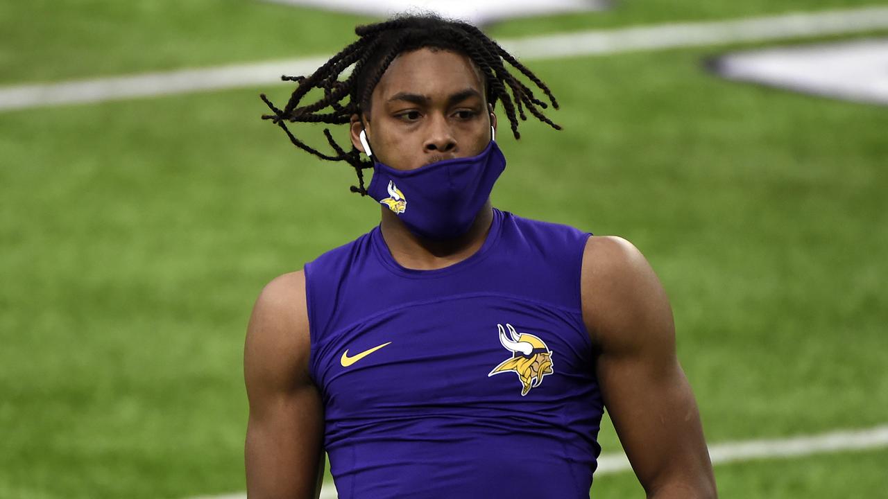 MINNEAPOLIS, MINNESOTA - NOVEMBER 29: Justin Jefferson #18 of the Minnesota Vikings warms up before the game against the Carolina Panthers at U.S. Bank Stadium on November 29, 2020 in Minneapolis, Minnesota. (Photo by Stephen Maturen/Getty Images)