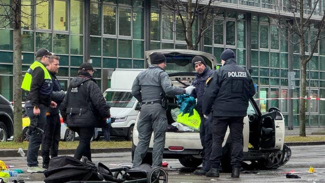 A passenger car drove into a street demonstration of striking workers from the Verdi trade union near the city centre and was then shot at by officer. Picture: Getty Images