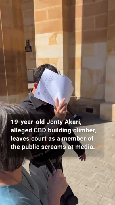 Alleged CBD climber Jonty Akari leaves court