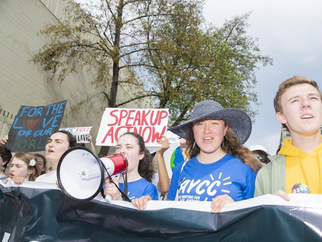 Bryher Mckewin (with mic) , Amelie Hudspeth and Toby Thorpe. Climate strike rally in Hobart. Picture: RICHARD JUPE