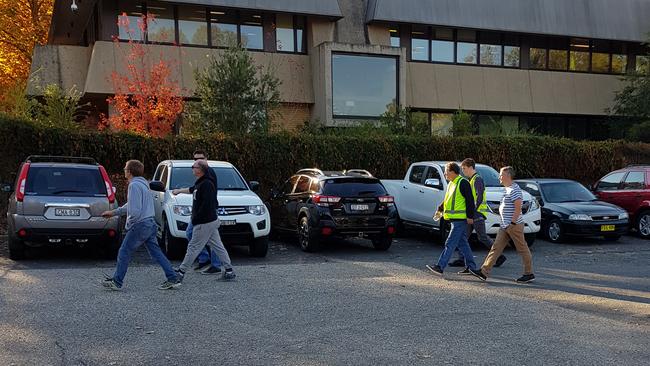 Workers return to the paper mill after the horror incident. Picture: Ed Gardiner