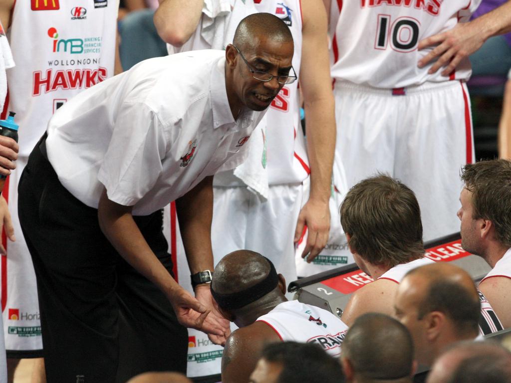 Former Hawks coach Eric Cooks during a timeout in Sydney Kings v Wollongong Hawks NBL game..