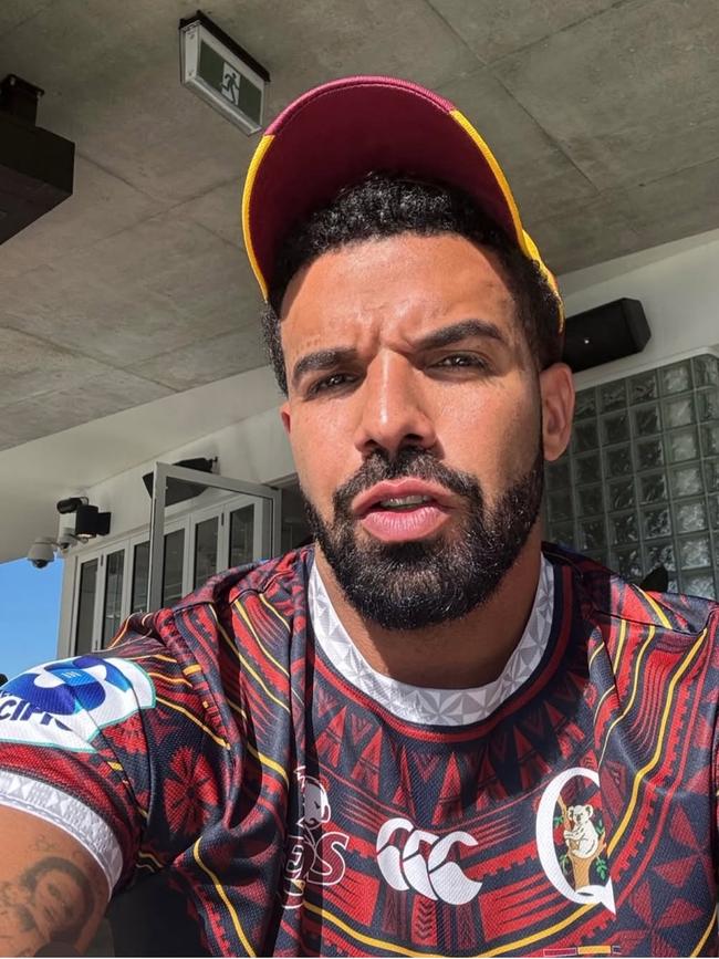 Rap star Drake wearing a Queensland Reds Pasifika jersey while on his Australian tour.