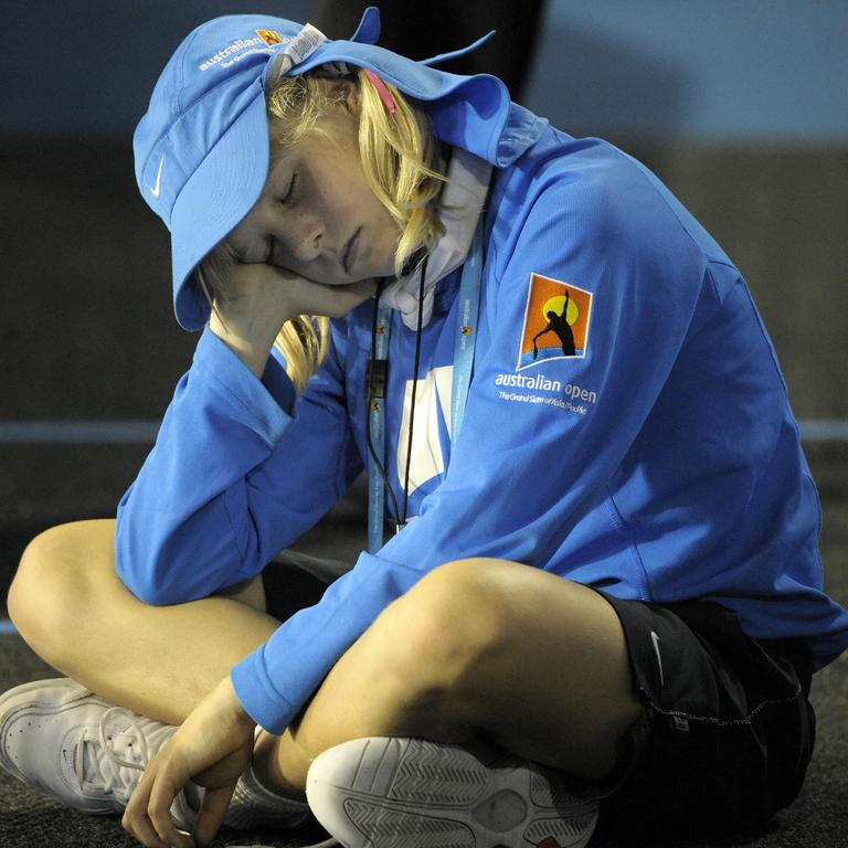 An exhausted ballkid during the 2008 Lleyton Hewitt–Marcos Baghdatis third-round match which did not begin until 11.47pm and finished at 4.33am – the latest finish to match in tour history. Picture: AFP