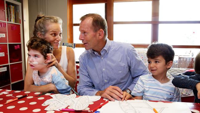 Member for Warringah Tony Abbott has been out and about speaking to constituents, such as Selena Lucas and her sons, about their concerns. (Pic: Troy Snook)