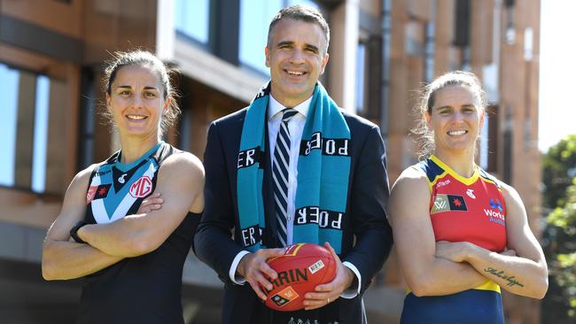 Port Adelaide vice-captain Ange Foley, SA Premier Peter Malinauskas and Adelaide captain Chelsea Randall at Adelaide Oval ahead of the first AFLW Showdown. Picture: Tricia Watkinson