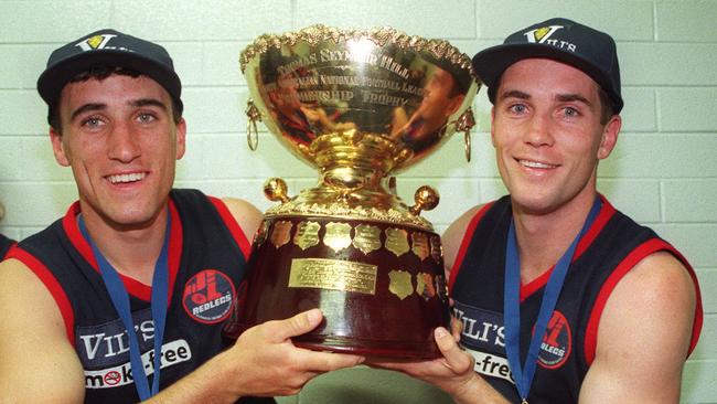 Brett James (right) with brother Roger after the 1997 SANFL grand final. Picture: File