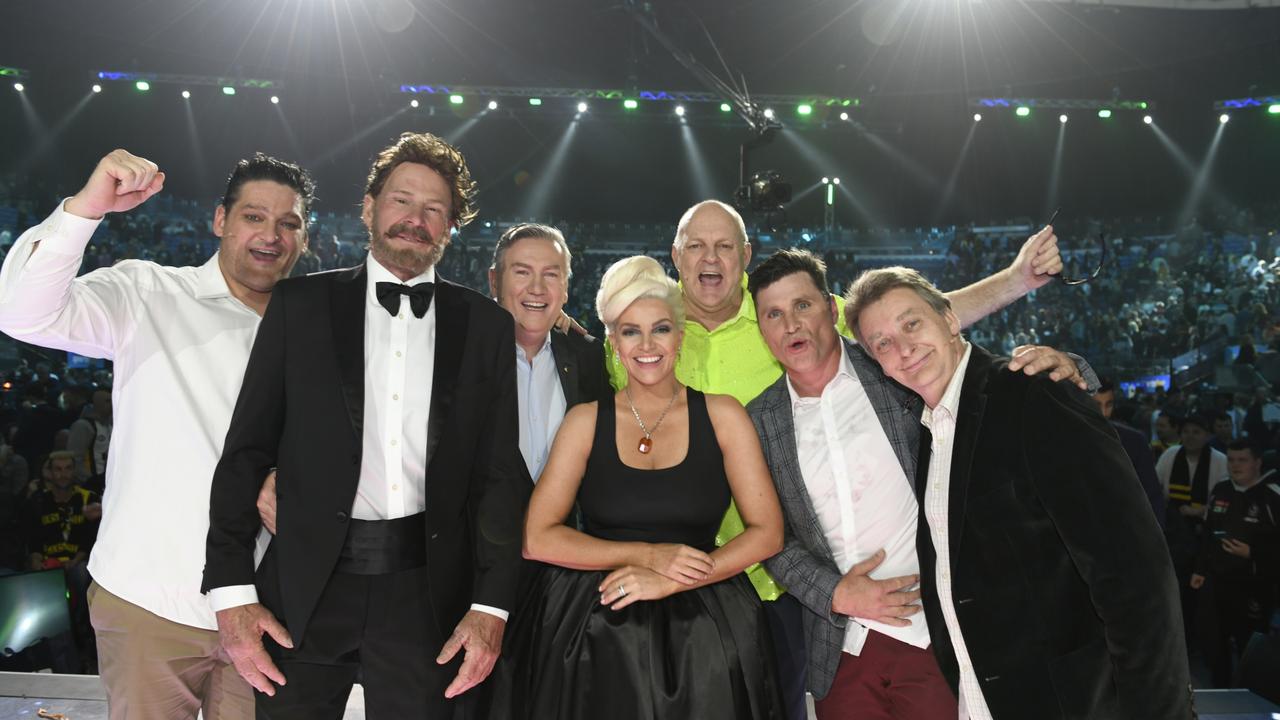 Brendan Fevola, Sam Newman, Eddie McGuire, Rebecca Maddern, Billy Brownless, Shane Crawford and Trevor Marmalade at the 2019 Footy Show Grand Final special. Picture: Supplied/Channel 9 .