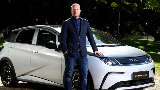 EVDirect.com CEO Luke Todd pictured with the new BYD Dolphin. Picture David Clark