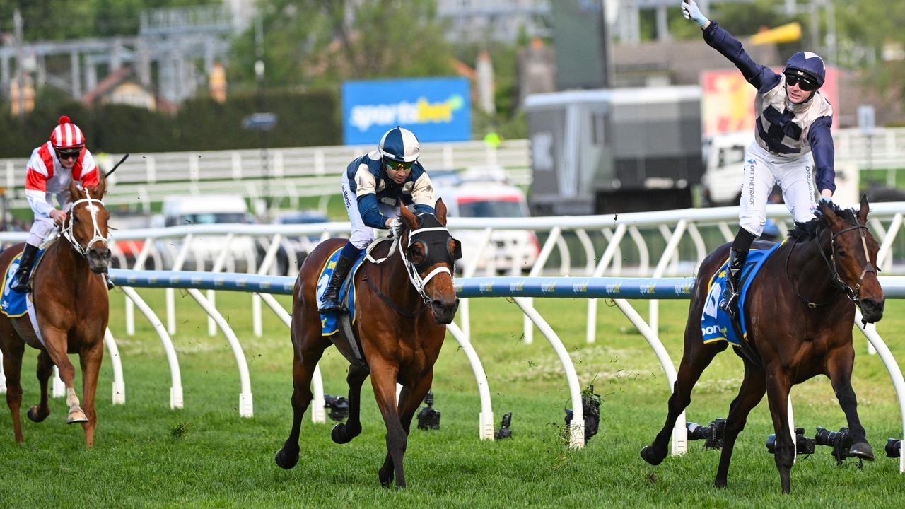 Buckaroo (centre) and Land Legend (left) chase home Duke De Sessa in the 2024 Caulfield Cup. Picture: Vince Caligiuri / Getty Images