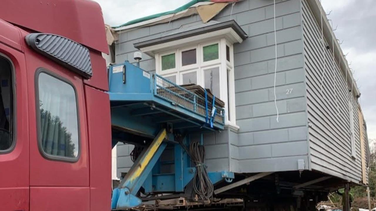 Hydraulic trucks are used to raise and lower homes into place as safely as possible. Picture: Moving Views.