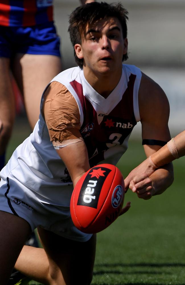 George Grey gets away a handball in last year’s preliminary final.