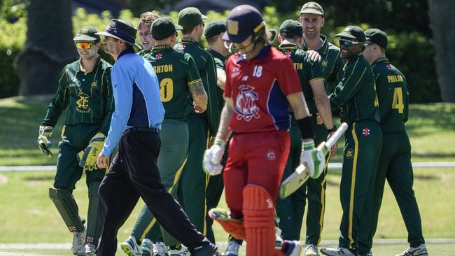 Premier: Northcote celebrates after dismissing Melbourne batsman Will Pucovski. Picture: Valeriu Campan