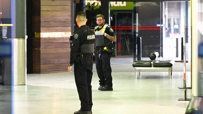 Police officers attend the centre in Marion on Sunday. Picture: NewsWire / Brenton Edwards