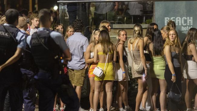 Cops look one at the very responsible revellers doing absolutely nothing illegal or fun. Picture: news.com.au