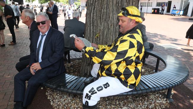 A punter reads the form guide at the 2024 Penfolds Victoria Derby day races at Flemington Racecourse. Picture: NewsWire/ David Crosling