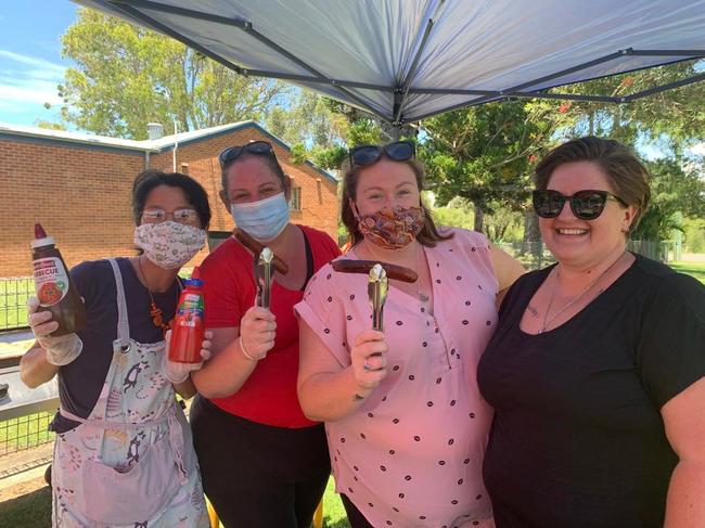 Lawrence Public School P&amp;C Association volunteers Yoko Christianson, Terena Tory, Lacey Sherden and Shai Winderlich have been manning the barbecue and craft stall outside the polling booths for the 2021 Clarence Valley Council elections.