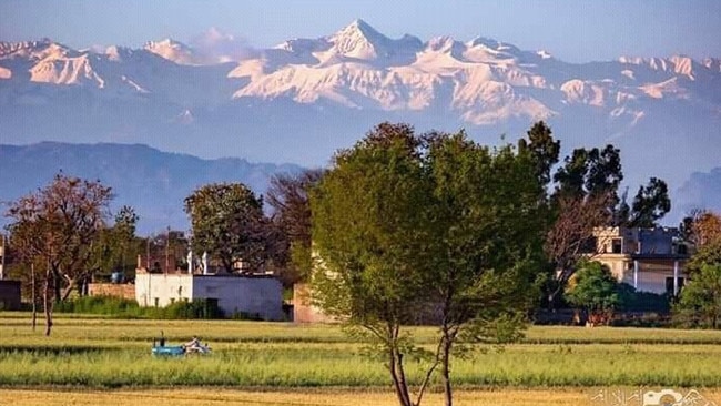 The Indian Himalayan Region of Janmu visible from Sialkot Pakistan after pollution levels dropped as a result of the COVID-19 lockdown