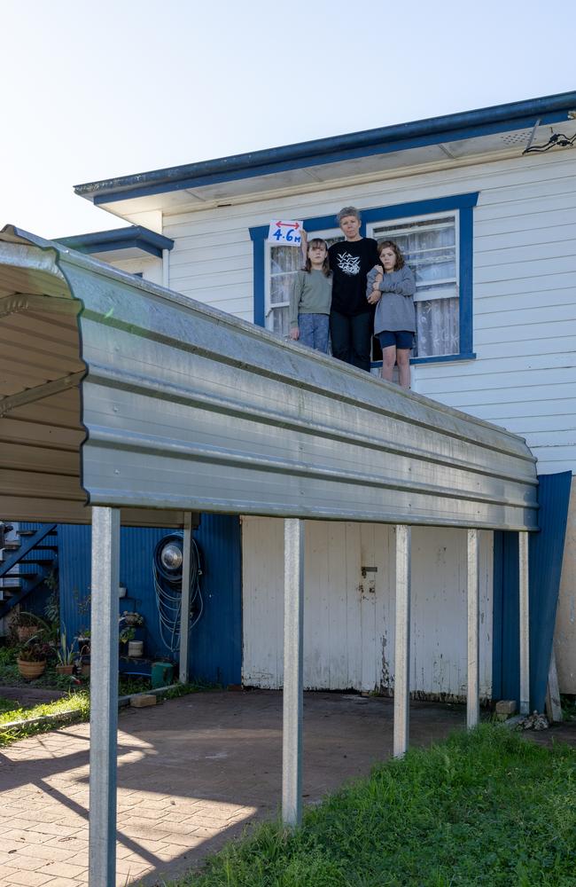 Indra Dhanusha and her children stood on the roof of their Lismore home in chest deep flood water waiting to be rescued. Indra has been refused a buyback, or any help, despite being in a high risk area. Picture Danielle Smith