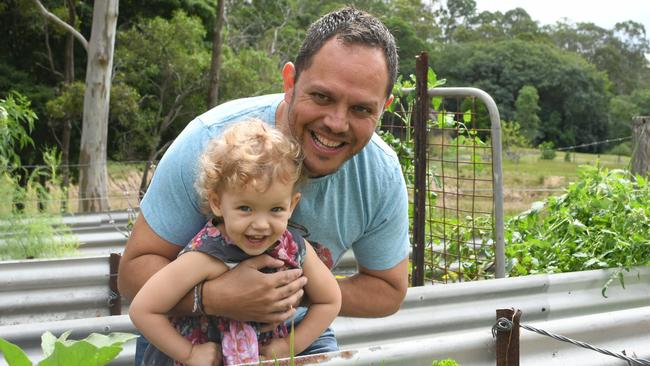 Alastair McLeod with his two-year-old daughter Clancy are enjoying time on their property in Samford Valley.