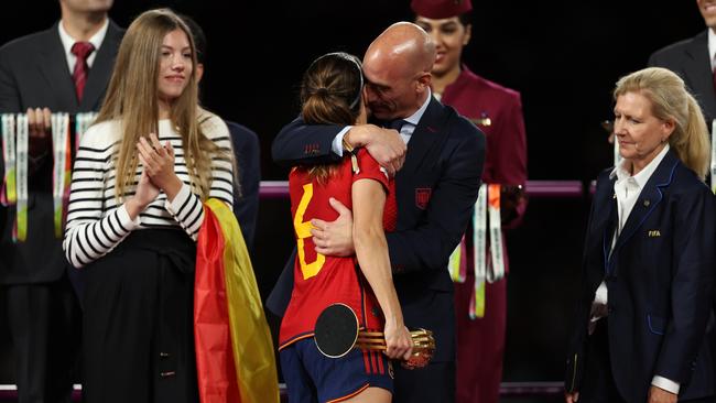 Rubiales embraces another player, Aitana Bonmati. The woman on the left is Infanta Sofia, one of the Spanish King’s daughters. Picture: Catherine Ivill/Getty Images