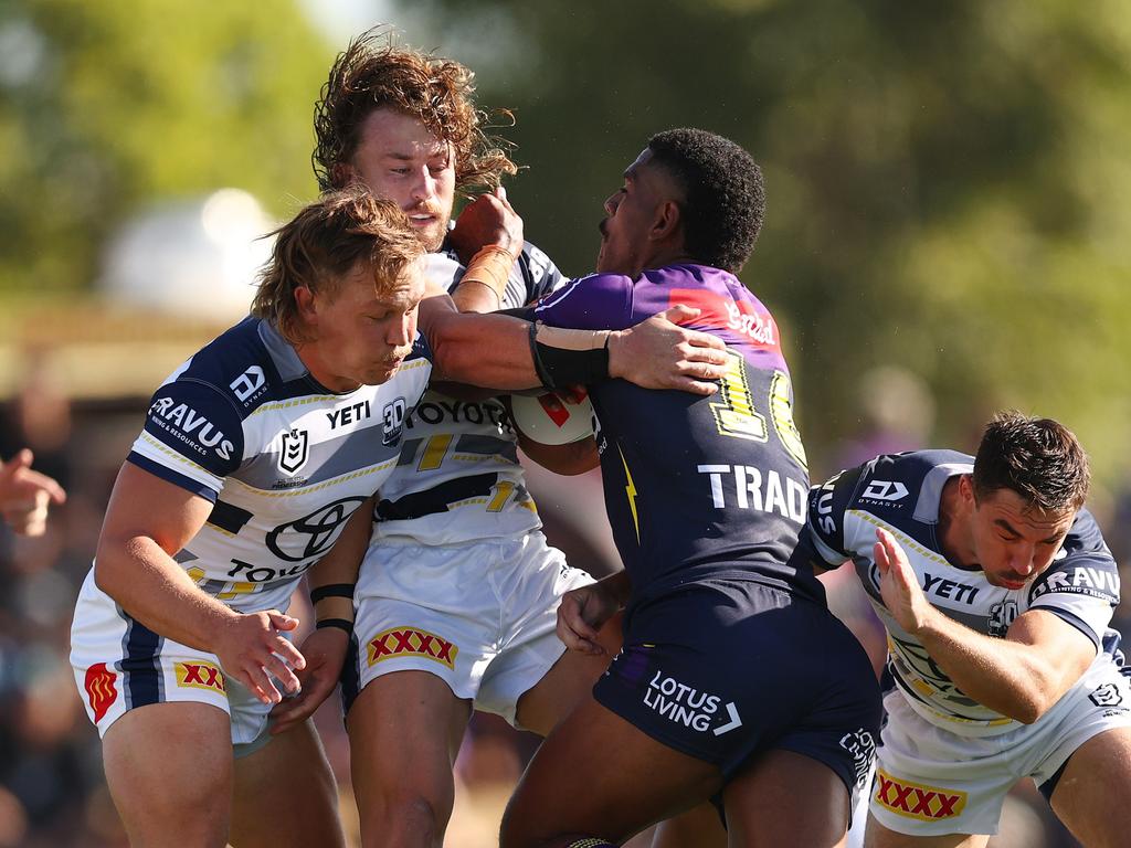 Cowboys defence muscles up against Tui Kamikamica of the Storm. Picture: Getty Images