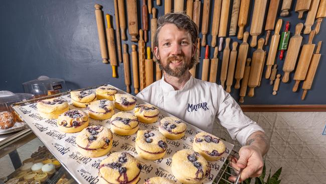 Mayfair Bakery owner Phil Donnelly and his gluten free cheesecakes. Picture: Ben Clark