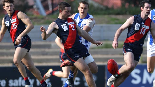 VFL: Coburg’s Jesse Corigliano kicks his team into attack. Picture: Hamish Blair