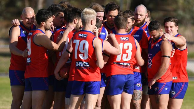 Mernda players come together before a game. Picture: Nathan McNeill