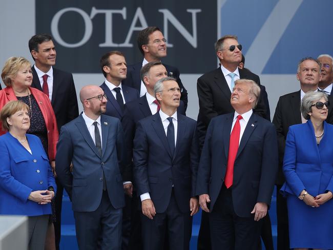 BRUSSELS, BELGIUM - JULY 11:  (From L to R, first row) German Chancellor Angela Merkel, Belgian Prime Minister Charles Michel, NATO Secretary General Jens Stoltenberg, U.S. President Donald Trump and British Prime Minister Theresa May attend the opening ceremony at the 2018 NATO Summit at NATO headquarters on July 11, 2018 in Brussels, Belgium. Leaders from NATO member and partner states are meeting for a two-day summit, which is being overshadowed by strong demands by U.S. President Trump for most NATO member countries to spend more on defense.  (Photo by Sean Gallup/Getty Images)