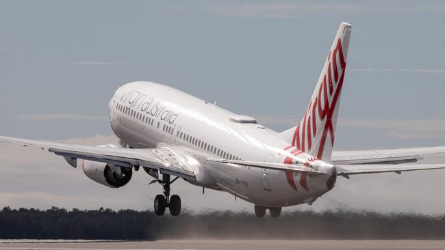 Brisbane Airport Corporation second runway opening in July last year. Residents say BAC new flights over the Bay were not realistic. Picture: Beau Chenery