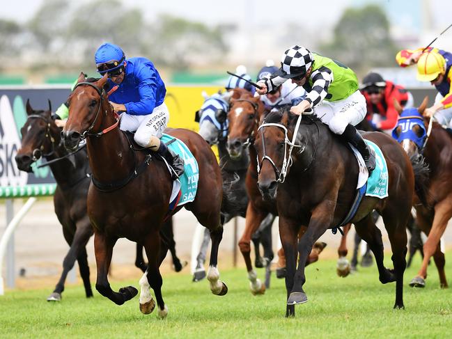 Jockey James McDonald rides Madam Rouge (centre) to victory in race 4, the Magic Millions Snippets, during Magic Millions Race Day at Aquis Park on the Gold Coast, Saturday, January 11, 2020. (AAP Image/Albert Perez) NO ARCHIVING, EDITORIAL USE ONLY