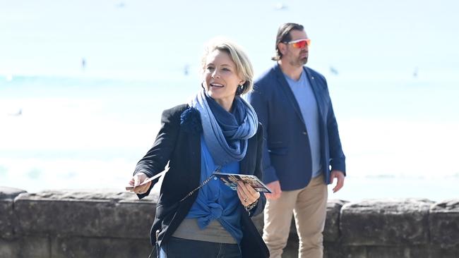 Liberal Candidate for the seat of Warringah, Katherine Deves, hands out campaign leaflets at Manly Beach. Picture: NCA NewsWire/Jeremy Piper