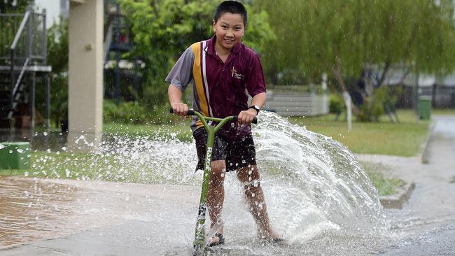 Jack Muller, 10, in Wulguru certainly noticed the rain. Picture: Wesley Monts