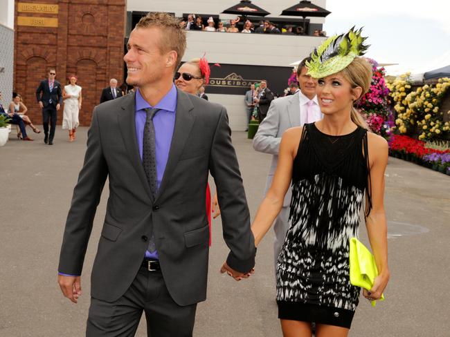 Lleyton and Bec Hewitt arrive at the 2014 Melbourne Cup.