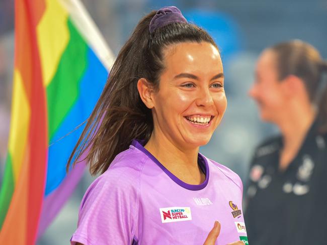 HOBART, AUSTRALIA - MAY 15: Ruby Baker-Doran of the Queensland Firebirds shares a laugh with her team before the round nine Super Netball match between Collingwood Magpies and Queensland Firebirds at MyState Bank Arena, on May 15, 2022, in Hobart, Australia. (Photo by Simon Sturzaker/Getty Images)