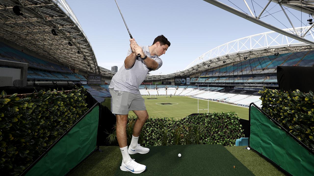 Mitchell Moses showed off his golf skills at the launch of G9 Stadium Golf at ANZ Stadium. Picture: Getty Images