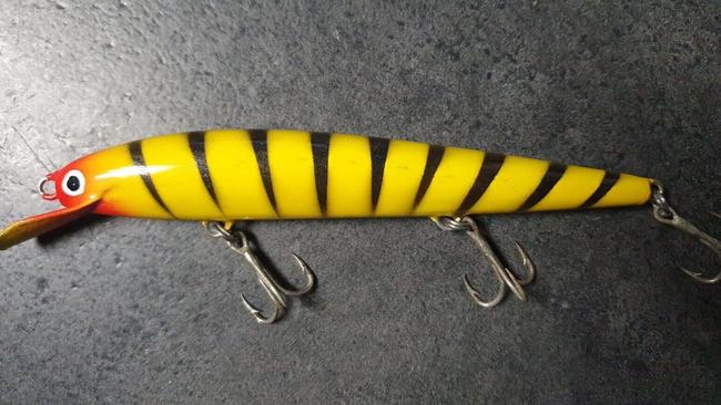 This rare signed Norm Edwards fishing lure fetched just over $429 on eBay in July this year. Picture: eBay / @m55mx