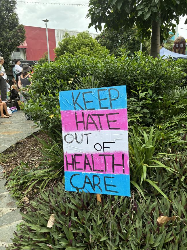 a placard reads 'Keep hate out of Health care'. Photo: Dylan Nicholson